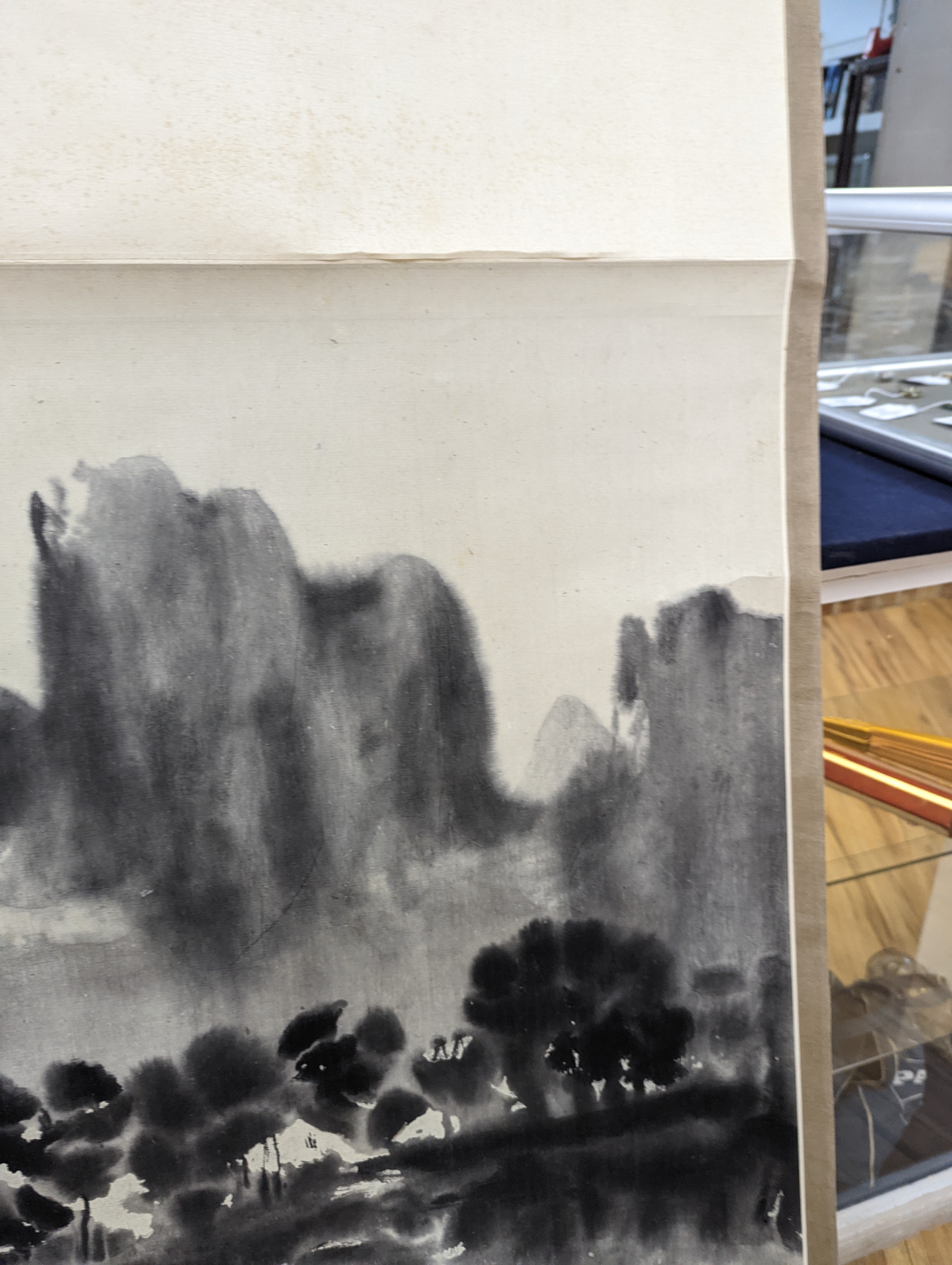 Two mid 20th century Japanese watercolour on paper scroll paintings, Boatman in a landscape, 79.5 x 113cm, and Cormorants on a bank, 103 x 106cm